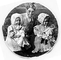 Mendel Ledington-right, Carrol Horton, left with Grandmother, Laura Tope Brown Johnson